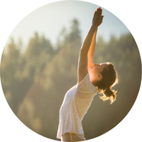 Person doing a yoga pose outside